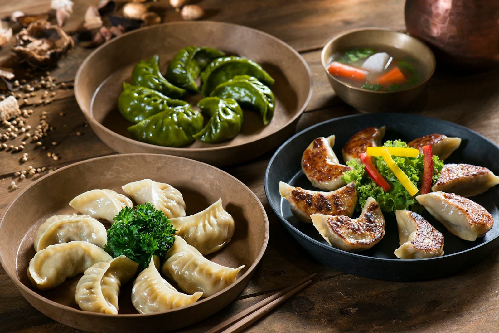 Assorted momos plated with herbs
